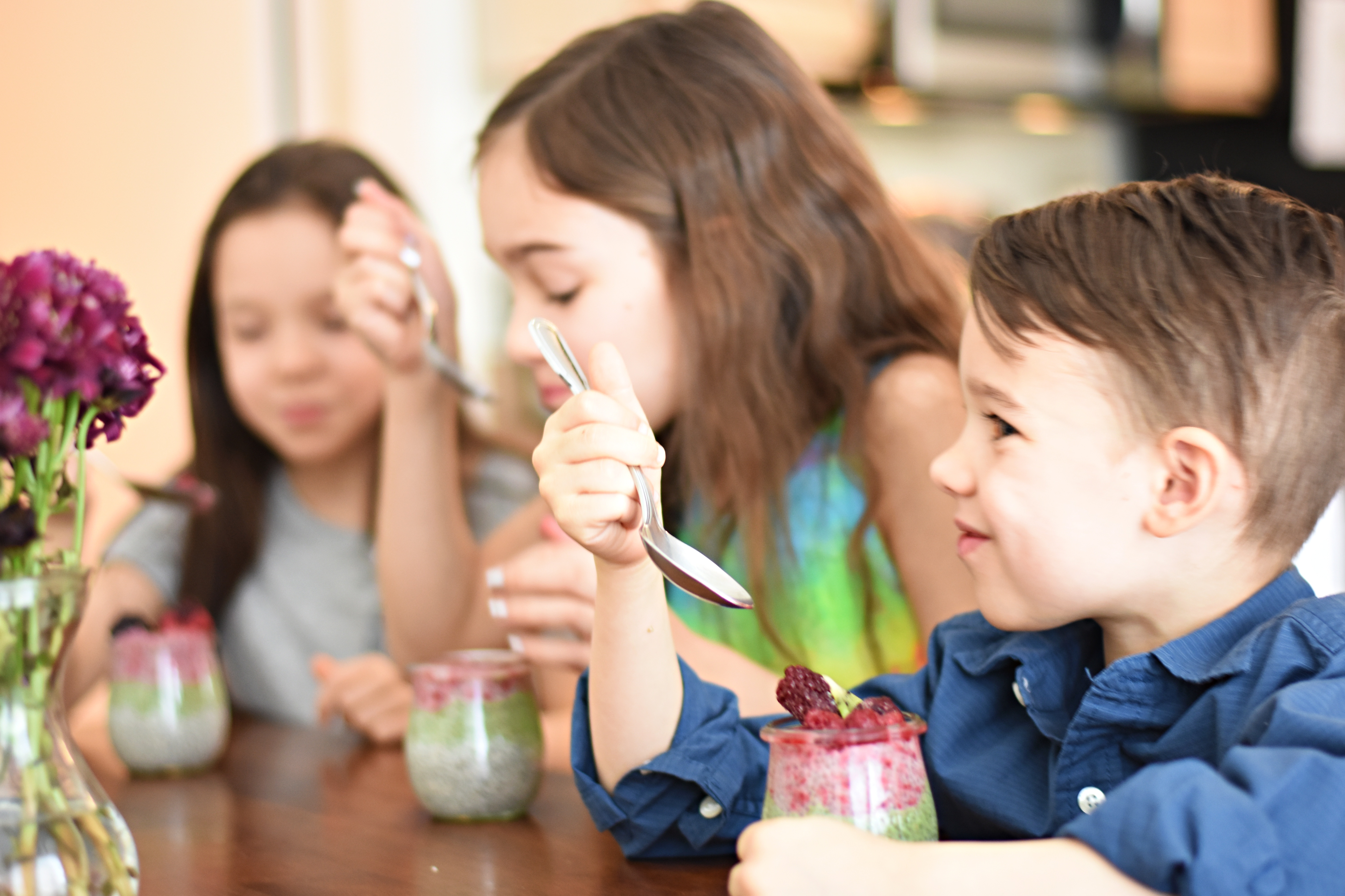 Kids eating chia pudding