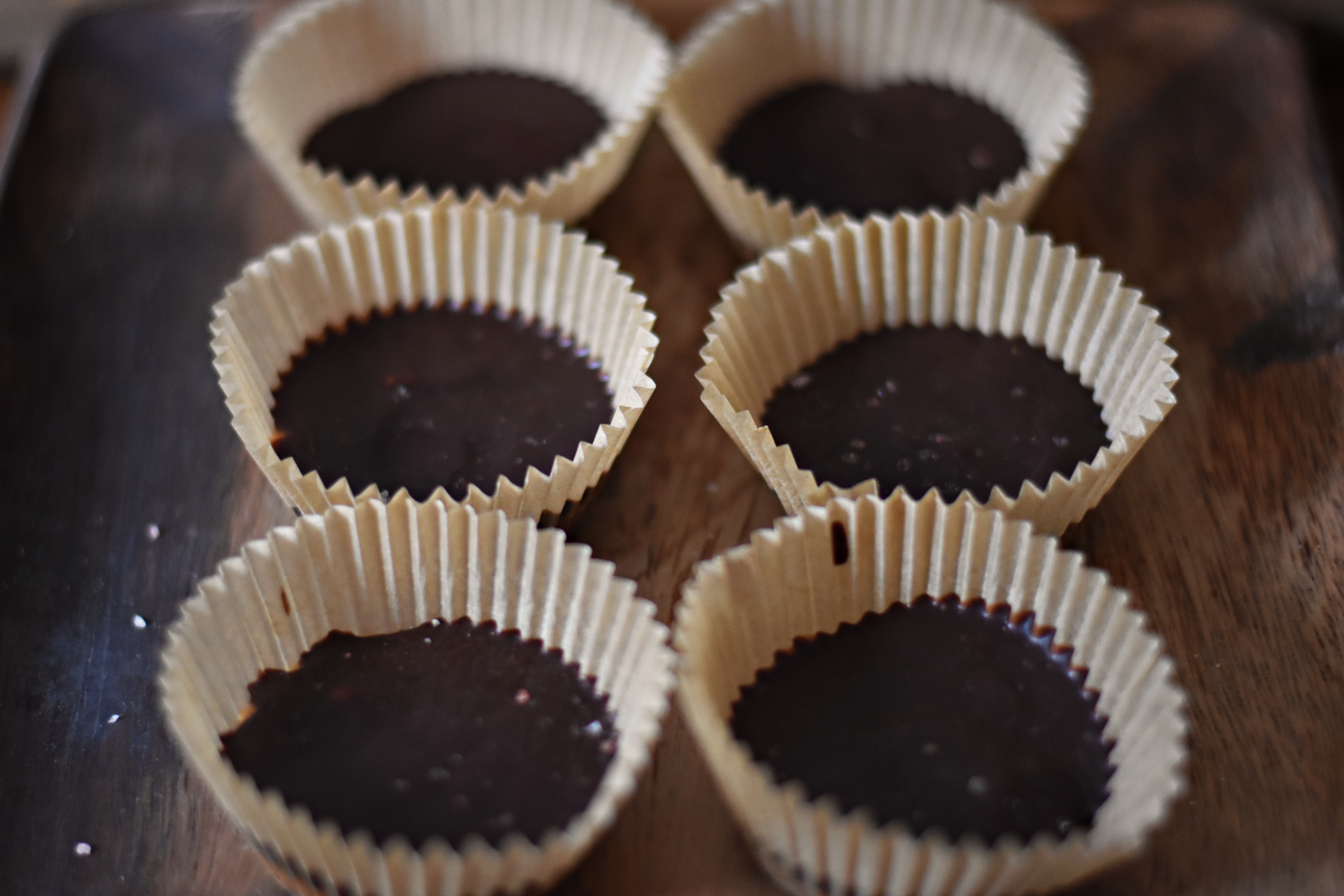 making raw peanut butter cups