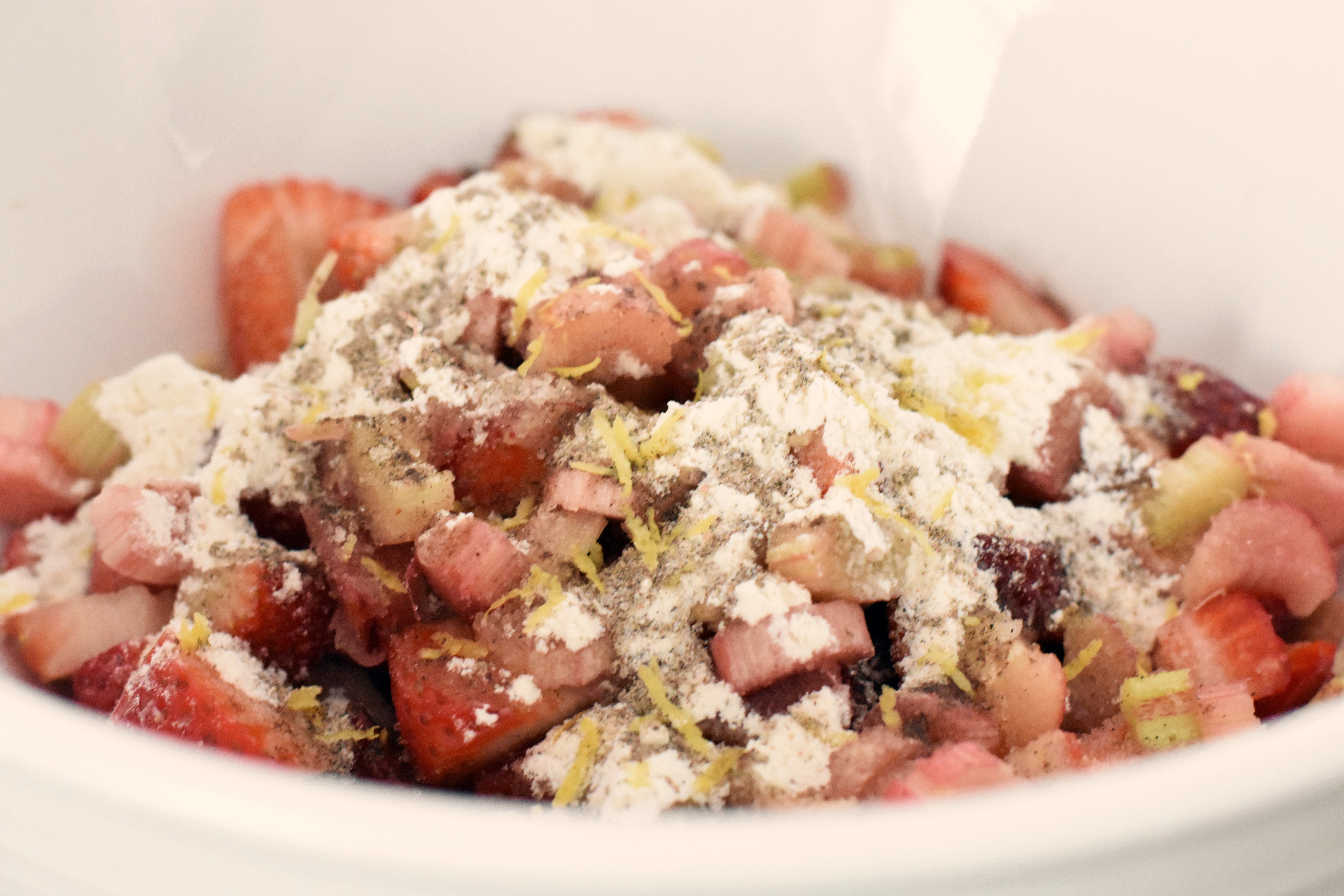 Making strawberry rhubarb pie