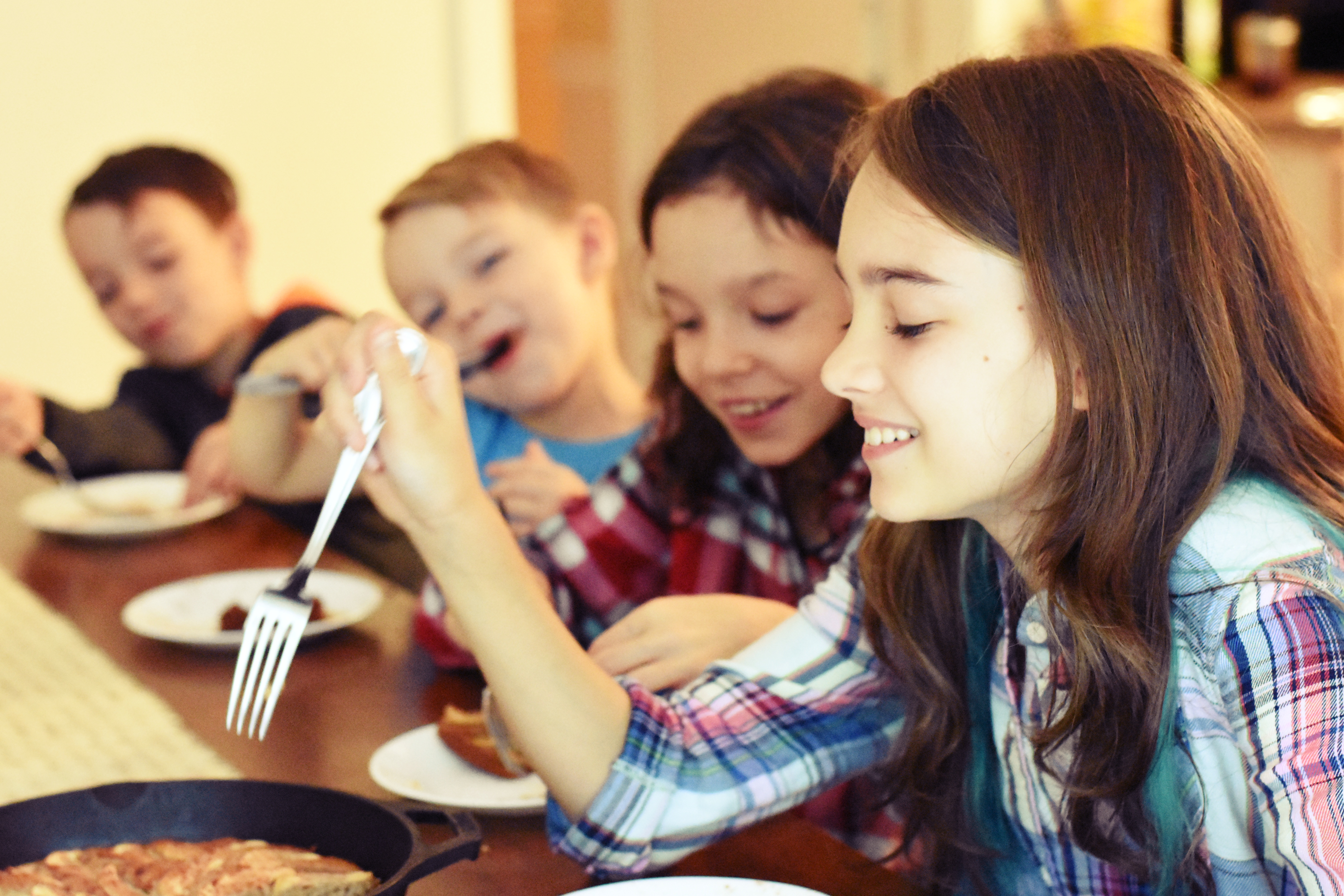 kids eating apple cider cake