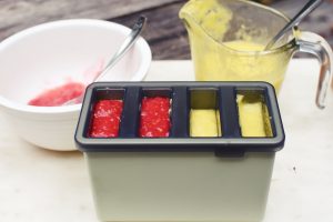 filling popsicle molds