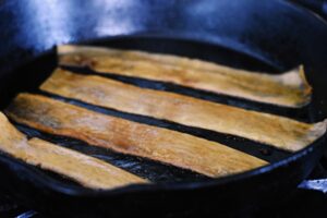 frying daikon bacon