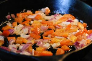 cooking onions and peppers