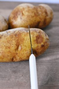 making Hasselback potatoes