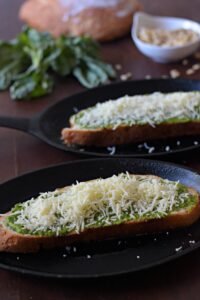 Making pesto breakfast toast