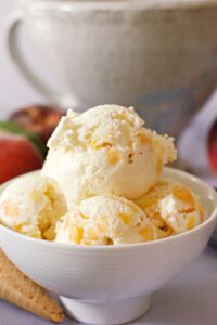 This no-churn peaches and cream ice cream will capture the essence of summer with fresh peaches and vanilla!